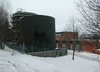 Skärholmen, Hästholmen 1, Ekholmsv 25.

Cisternerna användes för olja fram till dess att värmepumpar kom att ersätta oljeeldningen. Numera fungerar de som vattencisterner.