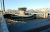 Skärholmen, Måsholmen 22, Skärholmsplan 1 o 3.

Den stora spiralvridna infartsrampen ligger i parkeringshusets södra del. Till vänster i bild skymtar Vårbergsvägen. Bilden är tagen från öster.