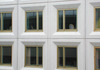Skärholmen, Måsholmen 25, oxholmsgränd 2-10.

Fasaden är uppbyggd av kvadratiska betongelement med yta av vit slipad marmormosaik, med fasade kanter in mot fönstren.