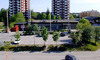 Akalla, Mariehamn 1, Mariehamnsgatan 9-13.

På den södra fasaden finns lastkajer. Söder om byggnaden finns en parkeringsplats.

 