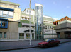 Skärholmen, Måsholmen 12, del av, Ekholmsvägen.

Östra delen av fd. polisstationen. Till höger syns den nya byggnaden i anslutningen till daghemmet på terrassen.