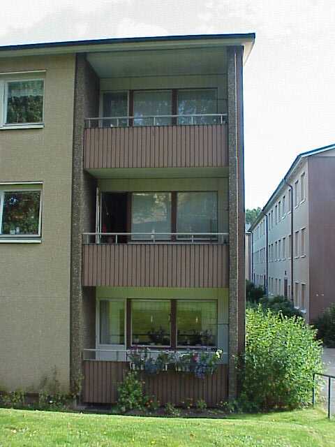 Lamellhusgavel med balkonger.