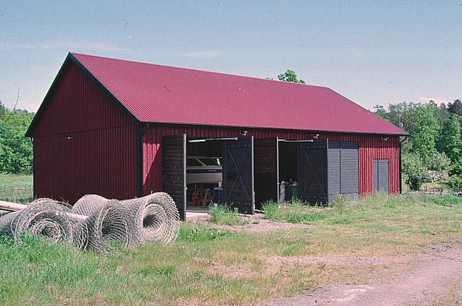 Hus nr. 9003. Loge, garage, maskinhall.