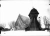 Torsångs kyrka och klockstapel från nordöst
