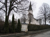 Kyrkan och kyrkogården mot nordost. 