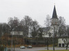 Kyrka och kyrkogård från nordväst. 