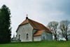 Exteriör av Laske-Vedums kyrka från nordöst, medeltida gavel synlig i nuvarande. Neg.nr. 04/119:07. JPG. 