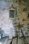 Ekby kyrka. Nummertavla och kors i tornrum. Neg.nr 04/236:17.jpg