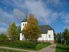 Nyskoga kyrka och kyrkogård från söder.