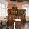 Predikstolen är också av Marcus Jäger från 1683. Dopfunten tillkom 1902.