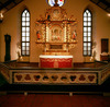 Altaruppsatsen i barock sparades från den gamla kyrkan. Den är snidad av Nils Lesberg i Göteborg och daterad till 1687.