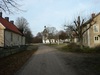 Skedevi kyrka med församlingshem och kyrkskola från söder.