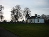 Skedevi kyrka och von Posts gravkor från sydöst.