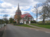 Tuna kyrka och kyrkogård från öster. 