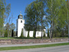 Kyrkan och kyrkotomten från söder. 
