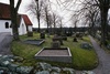 Kyrkogården norr om Stora Lundby kyrka, från Ö.