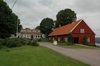 Corps de logi-byggnaden och "Röda längan" är de äldsta bevarade byggnaderna inom Gullmarbergs säteri