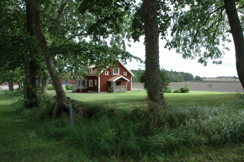 Hedåkers säteri, arrendatorsbostaden omgiven av en stengärdesgård.