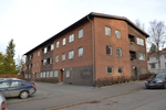 Flerbostadshus tillhörande Fåfängan 6, sett från Tullgatan.