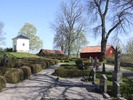 Fogdö kyrka, kyrkogårdens sydöstra del med gravkor, bod och sockenmagasin