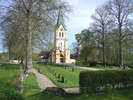 Helgarö kyrka, kyrkoanläggningen sedd från väster