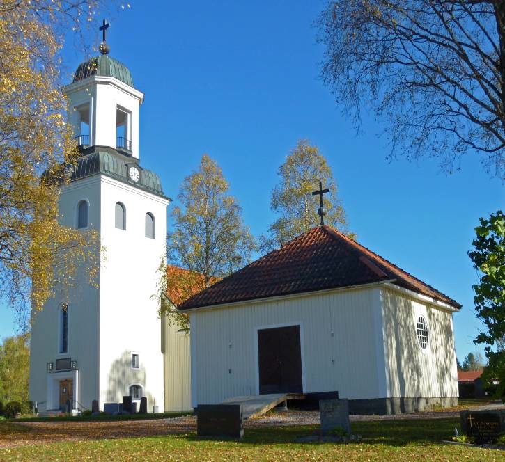 Kyrkan ligger i centrala Bjurholm och kyrkogården har successivt brett ut sig västerut och sedan norrut. Den första kyrkan i Bjurholm stod färdigt 1807. Dagens kyrka är den tredje på samma plats och invigdes 1935. Fem år tidigare byggdes gamla gravkapellet, även det i klassicistisk stil. Kyrkan och gravkapellet utgör en fin ensemble och det tidstypiska gravkapellet är ett värdefullt inslag i kyrkomiljön.