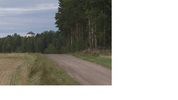 Den grusade landsvägen söder om Västra Skedvi kyrka Digitalfoto Rolf Hammarskiöld 