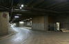 Skärholmens centrum ligger på ett stort betongdäck. Under betongdäcket finns ett system av last- och servicegator.

