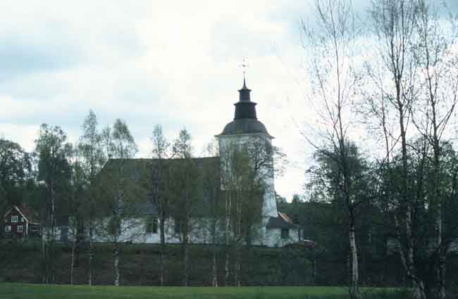 Brattfors kyrka fotograferad från riksväg 63.