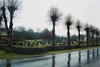 Begravningsplatsen vid Kalvs kyrka på andra sidan landsvägen, från SV.