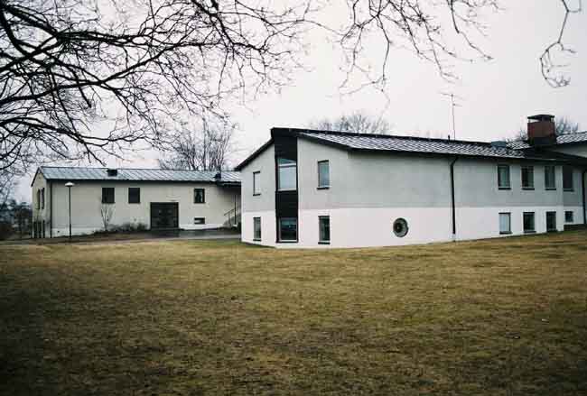 Norrstrandskyrkan, exteriört och den intilliggande pastorsexpeditionen.