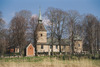 Brännkyrka kyrka, exteriör från söder. Nordväst om kyrkan skymtar det Lagerbielkeska gravkoret. I söder, närmast i bild, ligger Odelbergs gravkor.