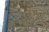 Gösslunda kyrka. Relief på korets östfasad.  Neg.nr 03/114:10