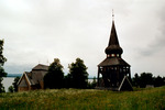 Hackås kyrka & klockstapel med omgivning, vy från norr.