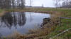 Uppströms Ekhammars kraftverk finns en liten dammanläggning, vars vattenspegel Turbindammen endast är drygt 500 kvadratmeter. Dammen utgörs i huvudsak av en enkel jordinvallad överfallsdamm som regleras av en så kallad trämunk.
