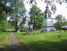 Viksjö kyrka med omgivande kyrkogård samt klockstapel, vy från sydöst. 