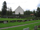 Eds kyrka med omgivande kyrkogård, vy från väster. 