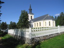 Junsele kyrka med omgivande kyrkotomt, vy från sydöst. 