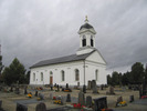 Ådals-lidens kyrka med omgivande kyrkogård, vy från sydöst. 