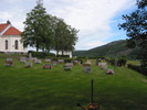 Vibyggerå nya kyrka med omgivande kyrkogård, vy från sydöst. 