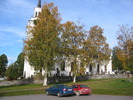 Lidens nya kyrka med omgivande kyrkogård, vy från sydväst. 