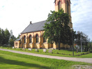 Holms kyrka med omgivande kyrkotomt, vy från nordväst.
