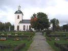 Indals kyrka med omgivande kyrkogård, vy från söder. 