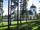 Selångers kyrka med omgivande kyrkogård, vy från norr. 
