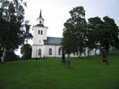 Sköns kyrka med omgivande kyrkogård, vy från söder. 