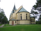 Skönsmons kyrka med omgivande kyrkotomt/park. Vy från sydöst. 