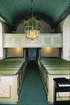Fivlereds kyrka interiör västparti med bänkrader och orgelläktare. Negnr 01/270:22a