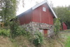 Källarvinden på Kalvshult med murad sockel och ovanvåning av trä. 
