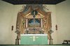 Altaret med altaruppsats från 1600-talets slut.