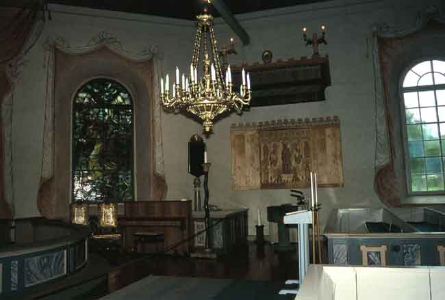 Dopplats på korets södra sida.